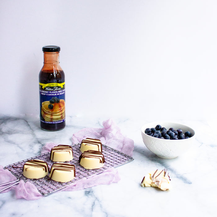 White Chocolate Cheesecake Bites with Blueberry Fruit Spread